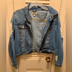 Distressed denim jacket